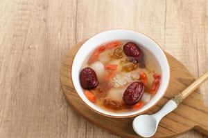 Peach Gum, Chinese traditional drink that contains peach gum, bird nest, red dates, snow fungus, goji berry, and rock sugar. photo