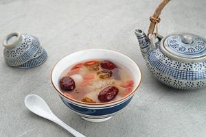 Peach Gum, Chinese traditional drink that contains peach gum, bird nest, red dates, snow fungus, goji berry, and rock sugar. photo