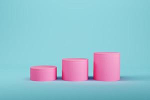 Pink cylindrical pedestal on light blue background for product display photo