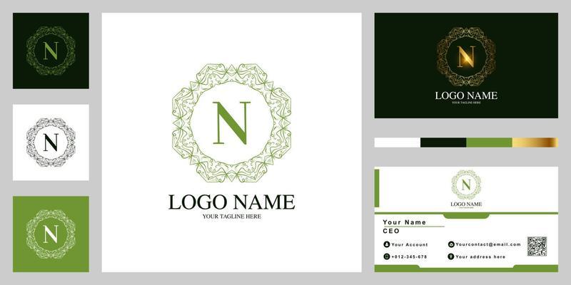 Letter N luxury ornament flower or mandala frame logo template design with business card.