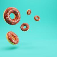 Donuts with glaze and colorful sprinkles on bright background with copy space photo