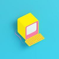 Yellow retro computer on bright blue background in pastel colors photo