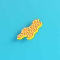 Yellow abstract hexagons on bright blue background in pastel colors. Minimalism concept photo
