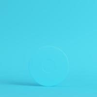 Vinyl record on bright blue background in pastel colors. Minimalism concept photo