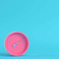 Pink gauge with ball on bright blue background in pastel colors. Minimalism concept photo