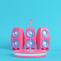 Concert stage with microphone and speakers on bright blue background in pastel colors photo