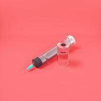 Syringe with vaccine on red background photo