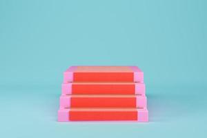 Pink stairs with red carpet on light blue background for product display photo