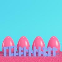 Pink easter eggs behind the fence on bright blue background in pastel colors photo