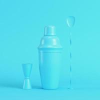 Cocktail shaker with jigger and mix spoon on bright blue background in pastel colors photo