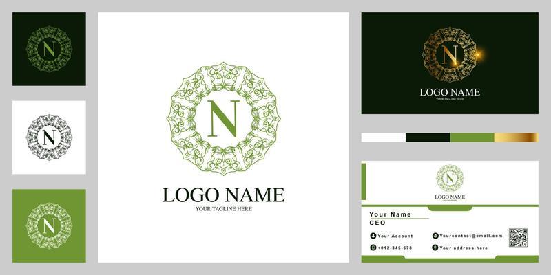 Letter N luxury ornament flower or mandala frame logo template design with business card.