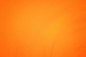 Orange abstract background texture. Blank for design, dark orange edges photo