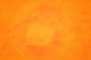 Orange abstract background texture. Blank for design, dark orange edges photo