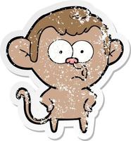 distressed sticker of a cartoon surprised monkey vector