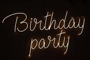 Birthday Party neon sign. Glowing neon lettering Birthday template photo