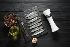 Fresh herring on rustic wooden background, close up shot photo