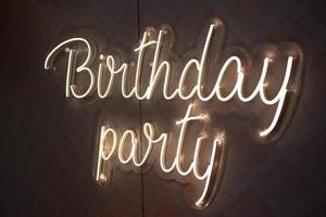 Birthday Party neon sign. Glowing neon lettering Birthday template photo