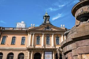 Facade of famous Nobel Prize Museum against blue sky during sunny day photo