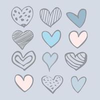 conjunto de doce corazones dibujados a mano aislados en un fondo gris vector