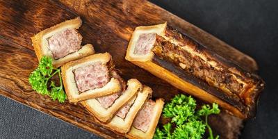 pate croute meat in dough pork, beef, chicken french food fresh healthy meal food snack diet on the table copy space food background rustic top view photo