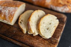 baguette bread soft bun fresh bakery food snack on the table copy space food background rustic top view photo