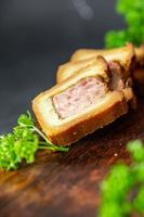 pate croute meat in dough pork, beef, chicken french food fresh healthy meal food snack diet on the table copy space food background rustic top view photo