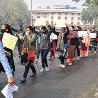 New Delhi, India December 25 2021 - Delhi Contractual Guest Teachers with posters, flags and graffitis protesting against Delhi AAP Government for making policy, Delhi Guest Teachers protesting photo