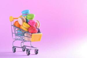 Colorful macarons or macaroons in shopping cart dessert sweet beautiful to eat photo