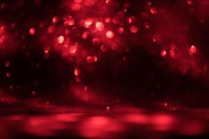 red glitter bokeh lights Blurred abstract background for Valentines, birthday, anniversary, wedding, new year and Christmas photo