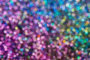 bokeh effect glitter colorful blurred abstract background for birthday, anniversary, wedding, new year eve or Christmas photo