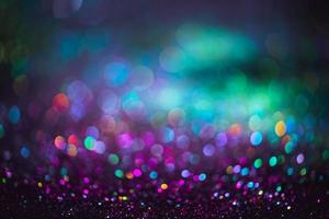 bokeh effect glitter colorful blurred abstract background for birthday, anniversary, wedding, new year eve or Christmas photo