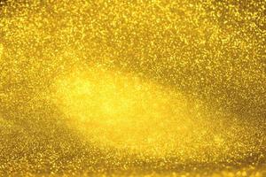 Golden glitter bokeh lighting texture Blurred abstract background for birthday, anniversary, wedding, new year eve or Christmas photo