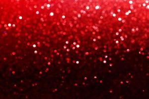 luces de bokeh de brillo rojo fondo abstracto borroso para San Valentín, cumpleaños, aniversario, boda, año nuevo y Navidad foto