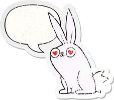 cartoon bunny rabbit in love and speech bubble distressed sticker vector