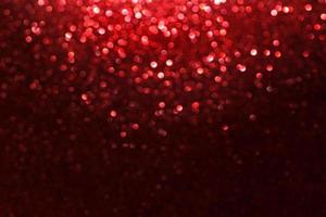 red glitter bokeh lights Blurred abstract background for Valentines, birthday, anniversary, wedding, new year and Christmas photo