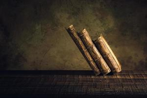 old books vintage on wood floor and paper aged background or texture photo