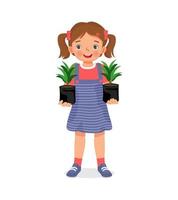 cute little girl holding Seedlings of plants in black plastic bags ready for planting in the garden vector