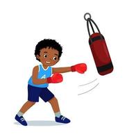 Cute little African boy boxer wearing boxing gloves hitting the punching bag training and exercising in the gym vector