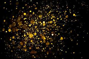 Golden glitter bokeh lighting texture Blurred abstract background for birthday, anniversary, wedding, new year eve or Christmas photo