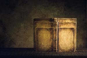 old books vintage on wood floor and paper aged background or texture photo