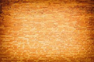 Red brown block brick wall Beautifully arranged texture background photo