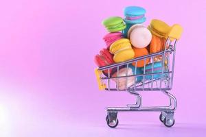 Colorful macarons or macaroons in shopping cart dessert sweet beautiful to eat photo