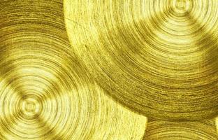 a metal Gold iron with circular texture background photo