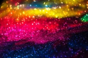 bokeh effect glitter colorful blurred abstract background for birthday, anniversary, wedding, new year eve or Christmas photo