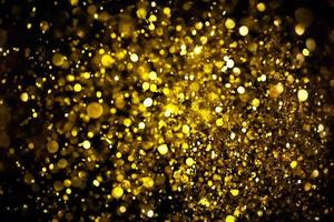 Golden glitter bokeh lighting texture Blurred abstract background for birthday, anniversary, wedding, new year eve or Christmas photo