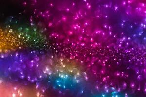 bokeh effect glitter colorful blurred abstract background for birthday, anniversary, wedding, new year eve or Christmas photo