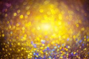 bokeh effect glitter colorful blurred abstract background for birthday, anniversary, wedding, new year eve or Christmas photo