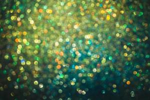 bokeh effect glitter colorful blurred abstract background for birthday, anniversary, wedding, new year eve or Christmas photo