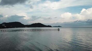 Fly toward Gertak Sanggul bridge during cloudy day in evening. video