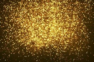 Golden glitter bokeh lighting texture Blurred abstract background for birthday, anniversary, wedding, new year eve or Christmas photo